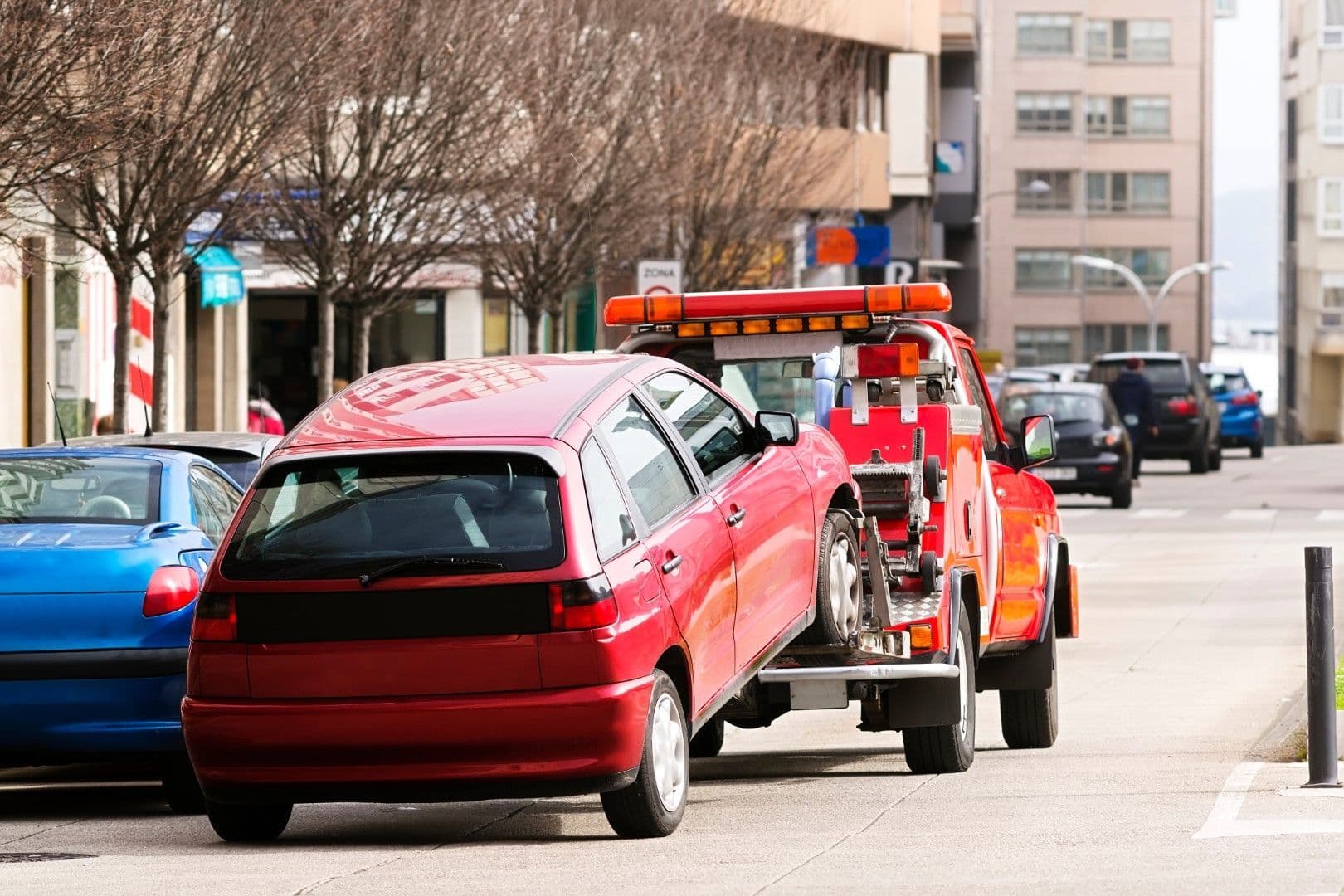 Fontana towing company flatbed tow truck ready for collision towing and vehicle recovery services
